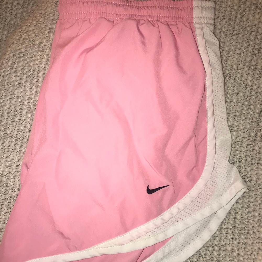 Pink Nike athletic shorts